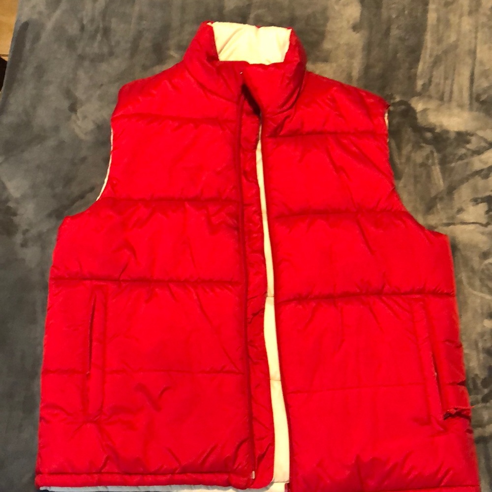 Reversible vest red and white. Size large.